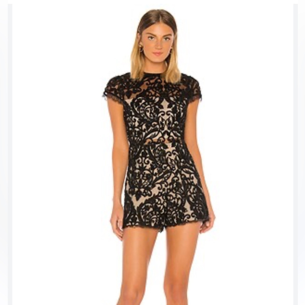 Alaina Mock Neck Romper in Black
Alice + Olivia
